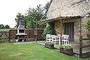 Gîte Le Pressoir - Terras met barbecue